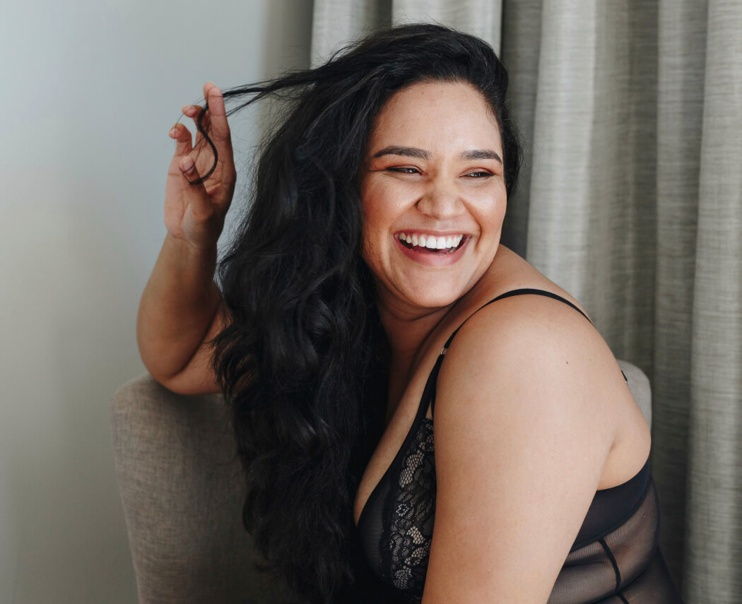 joyful-moment-captured-as-a-woman-laughs-playfull-2024-07-03-16-27-15-utc (1)